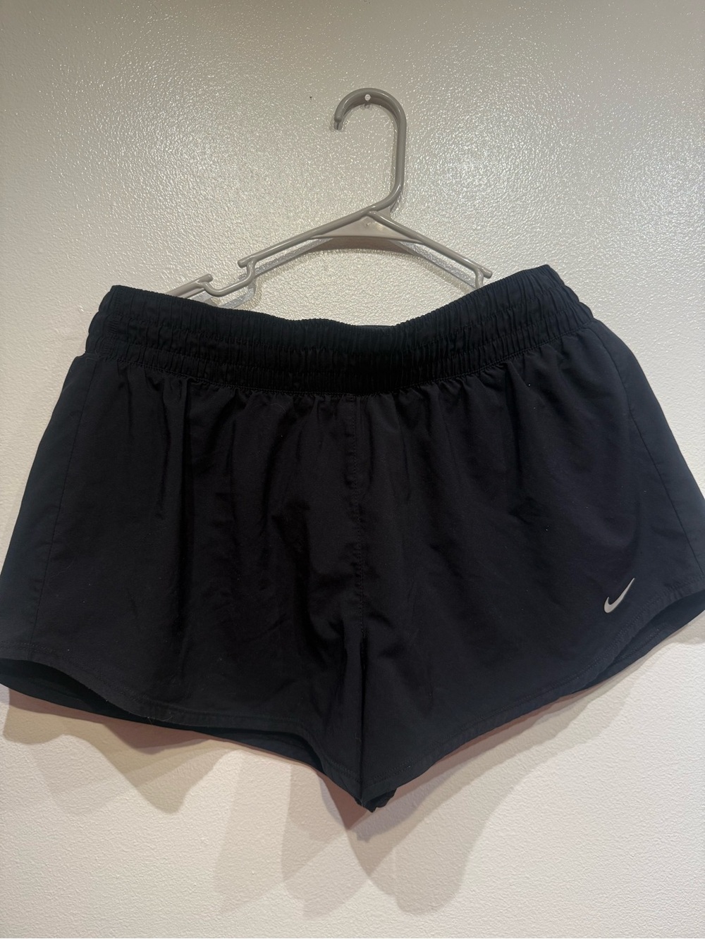 Nike Women's Black Athletic Running Shorts with Silver Swoosh
